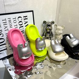 Hot selling EVA metallic rabbit slippers for girls wearing thick soles outside in summer, with a feeling of stepping on feces and anti slip. The trend of cool slippers