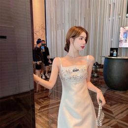 Women's Dresses Miui Clothes Designer's Spring Summer Sexy Slim Fit Strap Silk Partydress Heavy Duty Nailed Beads Water Diamond Letter Embroidery Champagne 49 98