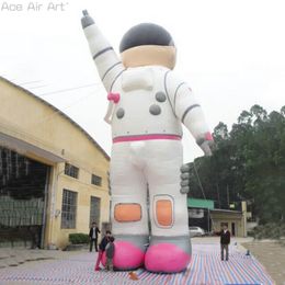wholesale Finger Pointing to The Sky Pink large Inflatable Female Astronaut Model with Fixed Rope and Air Blower for Advertising or Event Made by Ace Air Art