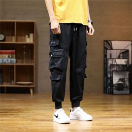 Men's Pants New Mens Casual Pants Slim Fit Small Feet Pants Social Youth Network Red Pants Tie Feet Work pants Y240422