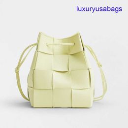 Womens Designer Cassette Cross-Body Bucket BotegaVeneta Mini/Small Sizes Intreccio Leather Cross-body Bucket Bag Interior Open Pocket Drawstring Closure O86F