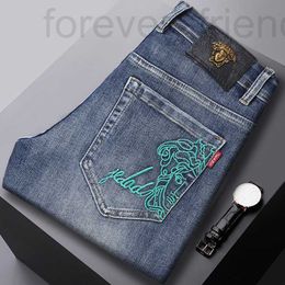 Men's Jeans designer 2023 Autumn/Winter New European High end Slim Fit Small Straight Tube Elastic Embroidered Hole Patch Pants CDFO