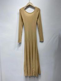 New sandro Slim fit round neck dress with long sleeves and side slit knitted skirt