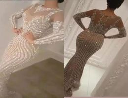 Yousef Aljasmi 2020 Luxury Long Sleeve Sequined Mermaid Prom Dresses Sexy Sheer Jewel Neck Evening Wear Beads Celebrity Prom Gowns7076740