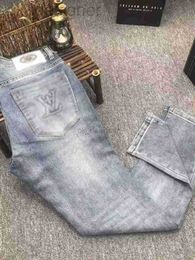 Jeans de jeans masculino marca de moda de ponta luminária jeans de luxo para o verão masculino novo impressão elástica Slim Fit Straight Blue Casual Calças