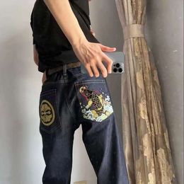 Primavera ed estate Nuovi jeans ricamati da carpa, popolari su Internet, marchio di moda in stile versatile sciolto gamba dritta spirit boys pantaloni 229580