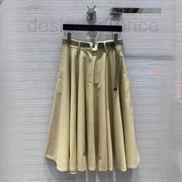 Skirts Designer Half skirt 2024 spring new age reducing college style metal buckle belt large skirt hem half skirt 9TH2