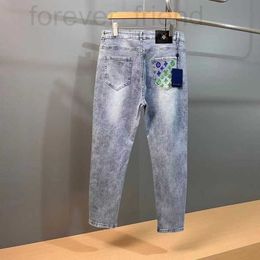 Men's Jeans designer Light blue new jeans, men's summer fashion label, fashionable slim fit, small feet, ruffian and handsome cropped pants 9TRB