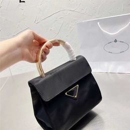 Tote bag high definition Ps ancient waterproof nylon canvas Oxford cloth metal ring handle portable flip small square tide female