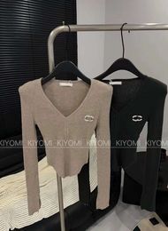 High-quality Luxury Version Of Spring New Brooch Shoulder Pads Early Autumn New Small Fragrance Sweater Top Thin Slim Sexy Short Sweater Fashion Clothing 43634