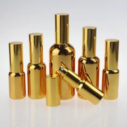 Storage Bottles China Suppliers 50ml Luxury Essential Oil Glass Bottle With Spray Pump Gold And Silver Perfume In Stock