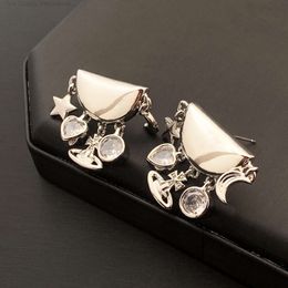 Luxury Viviennes Westwoods Earring Designer Earring for Woman Saturn Earring Asciutto Rete French Show West Empress Dowager Star Earrings High End Style S925