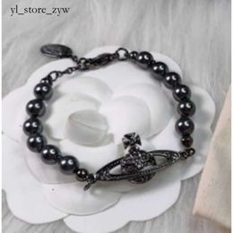 Viviane Westwood Necklace Designer Viviane Luxury High Version Western Empress Dowager Gun Black Saturn Pearl Necklace Bracelet Set Cool Plating Black Saturn 510