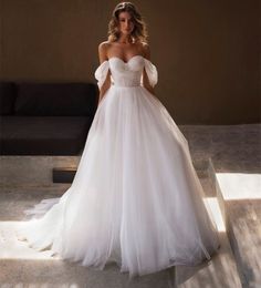 Elegant Long Tulle Sweetheart Wedding Dresses with Pearls A-Line Ivory Off Shoulder Sweep Train Lace Up Back Simple Bridal Gowns for Women