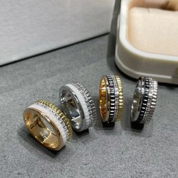 Parringar 925 Sterling Silver Rotating Ring Plated med 18K Gold Gear Set med Diamond Transport Black and White Ceramic Ring High Edition smycken