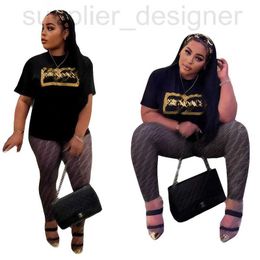 Kvinnors tvådelade byxor Designer Q6039 Summer och Autumn New Gold Stamped Casual Short Hidees+Pants Set 1A5o