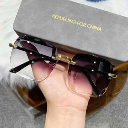 Sunglasses Frameless cut edge sunglasses new summer sun visors transparent multi-color lens UV400 womens sunglasses J240423