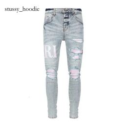 Man Pants Black Skinny Stickers Light Wash Amri Jeans Ripped Motorcycle Rock Revival Joggers True Religions Amri Men High Quality Brand Trousers Jeans 7058