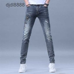 Light Luxury Jeans Mens 2024 Summer Hot Diamond Print Leisure Tattoo Fake Hole Slim Fit Long Pants Fashion Brand