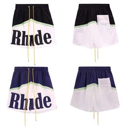 Trendy RHUDE Letter Colour Blocking Casual Sports Elastic Shorts for Men and Women's American High Street Beach Pants