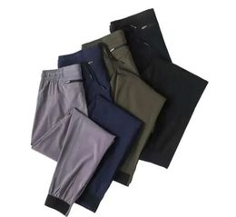 LU LL Men's Jogger Long Pants Sport Yoga Outfit Quick Dry Drawstring Gym Pockets Sweatpants Trousers Mens Casual Elastic Waist fitness Designer Fashion Clothing 9087