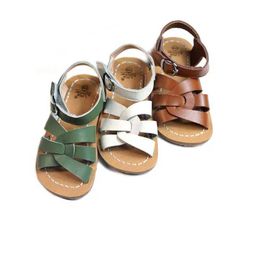 Sandaler Cowhide Children Saltwater Sandaler Högklassiga äkta läderflickor Sandaler Non-halk Sole Boys Shoes 6t 240423