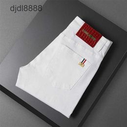 Spring European Fashion Brand Jeans Light Luxury Mens Elastic Pants Small Straight Tube Anti Fading New Three Proof Fabric