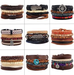 4pcsset Handmade Boho Gypsy Hippie Black Leather Rope Cord Wing Hand Leaves Compass Charm Stackable Wrap Bracelets for Man1136599