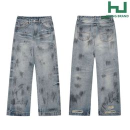 Indústria pesada pintada à mão, desgastada, lavada e cortada em pedaços, projete jeans sensoriais, tubo reto de masculino e feminino Versão básica solta versátil calças versáteis