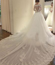 Gorgeous Illusion Long Sleeve Wedding Dress Scoop Neck Beaded Lace Appliques Sheer Heart Shaped Back Dress with Long Train Bridal 7439642
