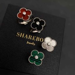 High-end Luxury Ring Fanjia High quality titanium steel plated 18K real gold clover ring for womens fashion and high-end feeling white mother