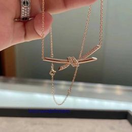 Luxury Tiifeniy Designer Pendant Necklaces High version new Knot knot necklace for girls with full diamond twisted collarbone chain cross pendant fashionable and v