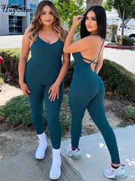 Kvinnors jumpsuits Rompers Hugcitar Solid Slips Backless Sexy BodyCon Tight Jumpsuit 2024 Spring/Summer Womens Jumpsuit Sportswear Vacation Set Y240425