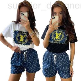 Kvinnors tvådelade byxor Designer Y71395 Fashion Summer New Printed Short Sleeved Shorts Set 3Bmk