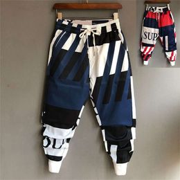 Nuovi uomini abbigliamento colorato casual per popolare su Internet Trendy Brand Tie Harun Mens Joggers pantaloni Corea Versatile Versatile Pantaloni piccoli