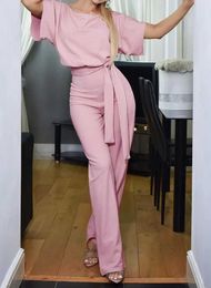 Women's Jumpsuits Rompers Elegant Spring/Summer Womens jumpsuit Solid Colour round neck lace up tight fitting suit with button short Slave womens jumpsuit Y240425