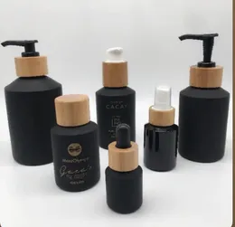 Storage Bottles 60ML 100ml Black Matte Glass Cream Jar Lotion Spray Pump Bottle With Luxury Bamboo Lid Wood Cap Cosmetic Container Face Mask