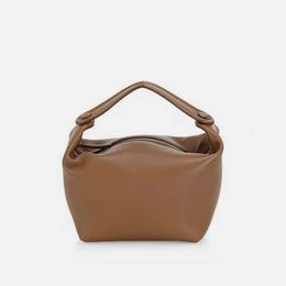high-end niche The cowhide Rows design top layer texture lunch box genuine leather portable underarm bag water bucket womens bag 4EBY