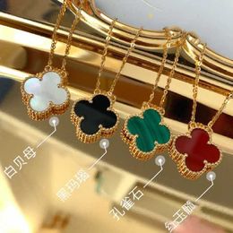 2024 Classic Four Leaf Clover Necklaces Pendants leaf clover necklace female rose gold lucky grass collarbone chain red agate inlaid diamond pendant original prin