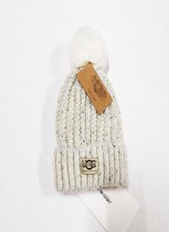 Whole High quality Winter caps Hats Women and men Beanies with Real Rcoon Fur Pompoms Warm Girl Cap snapbk6347292