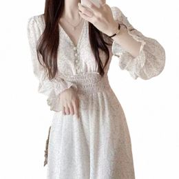 Damenkleider V-Ausschnitt Dot dünner Chiffon Kleid gedruckter Knopf Puffarm hoher Taille Eleganter Rock Schwarze weiße lässige lässige Kleider