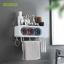 2ZA7 Toothbrush Holders Ecoco Non Punched Wall Mounted Toothbrush Holder Toothbrush Cup Automatic Toothbrush Squeeze Dispenser Bathroom Accessories Set 240426