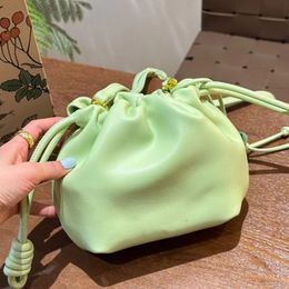 Women's luxury designer bag New French top leather one-shoulder crossbody handbag Dumpling bag Handheld drawstring fashion mini pleated bucket cloud bag