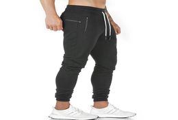 2021 New Jogging Pants Men039s Zip Pocket Joggers Fitness GYM Training Pants Sportswear Sports Running Workout Athletic Sweatpa7139024