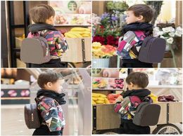 Sell Kids Backpacks Fashion High Quality PU Shoulders Bags Kindergarten Baby Boys Girls School Bag Classic Printing Book Packa9818249