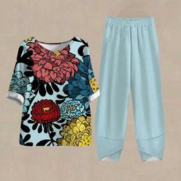 Kvinnors tvåbitar byxor Fashion Summer Plants Tryckt 2-stycken Set High midjebyxor Damkläder Elegant Vintage Spring T-shirt Pants Female Clothing Y240426