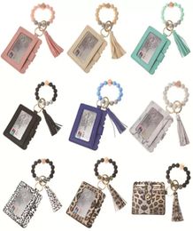 Stock PU Leather Bracelet Wallet Keychain Party Favour Tassels Bangle Key Ring Holder Card Bag Silicone Beaded Wristlet Keychains H3231381