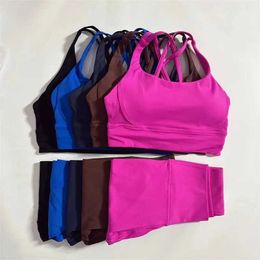 Women's Tracksuits Solid color gym yoga set tight leg exercise fitness cross bra top 2 pieces of soft sportswear womens sportswear training 240424