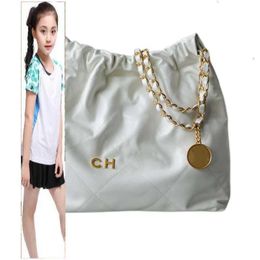 Kids Bags CC Bag Wallets The leather tote bag designer bags has a metallic sheen latest ZP drawstring chain Wide range of colors fashion chains handba