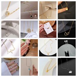 2024 Classic Four Leaf Clover Necklaces Pendants New Diamond Inlaid Titanium Steel Necklace for Womens Versatile Instagram Popular Light Luxury collarbone Chain